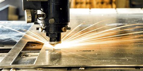 Laser cutting of holes in thick sheet metals: Development of 